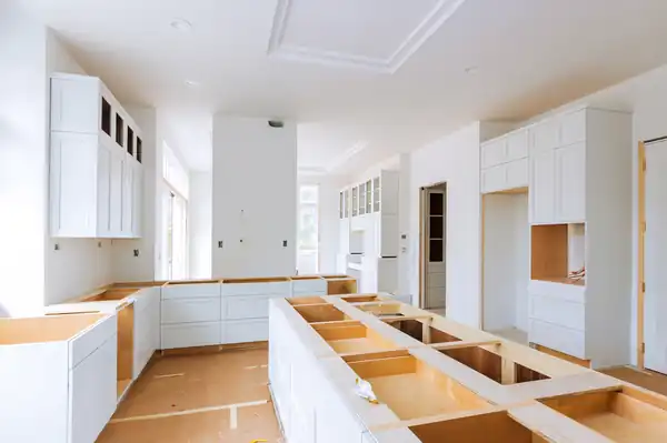 Cabinet installation under way in a residential kitchen