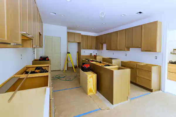 Cabinet installation under way in a residential kitchen