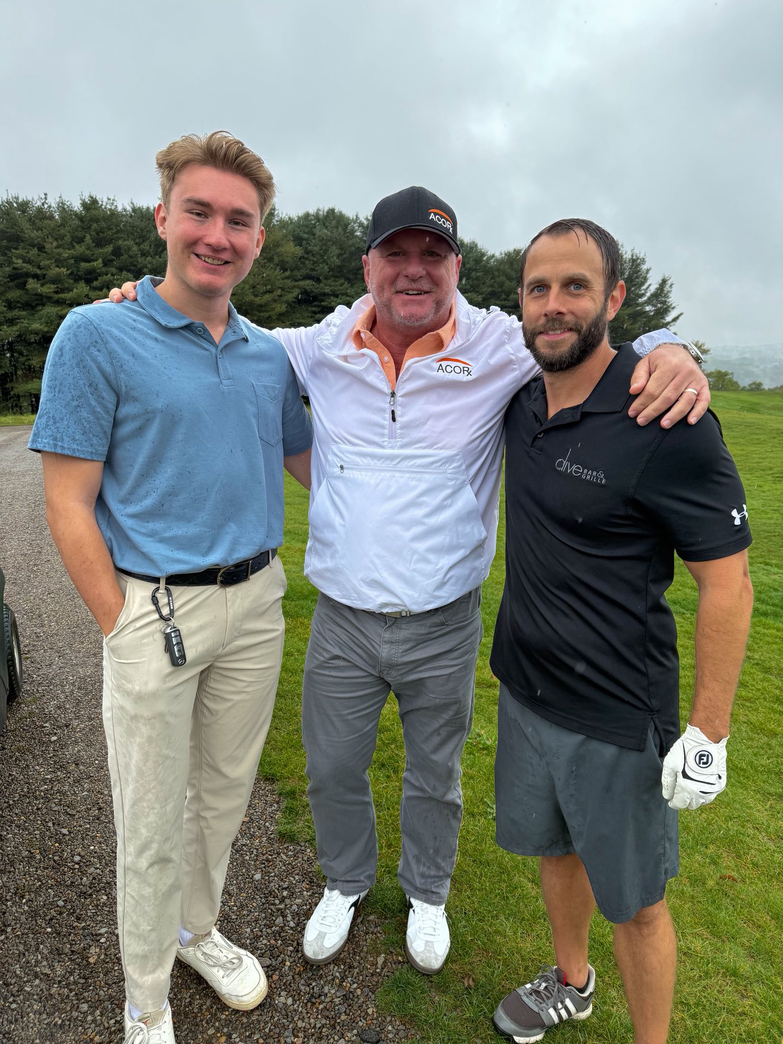 Three men who have been part of YINZgiving since the beginning, at the 2025 golf outing