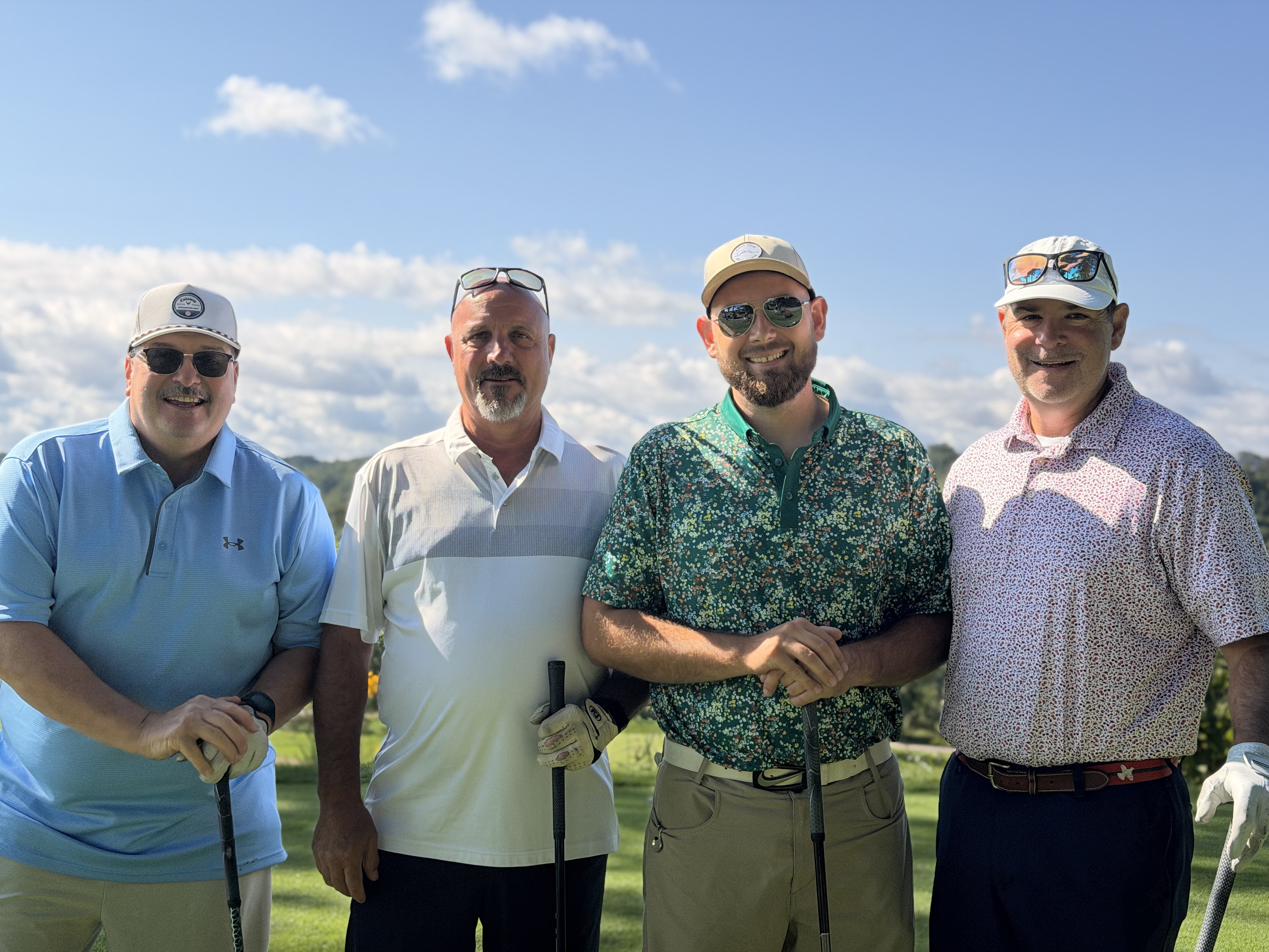 A foursome at Wildwood Country Club on YINZgiving Golf Outing day