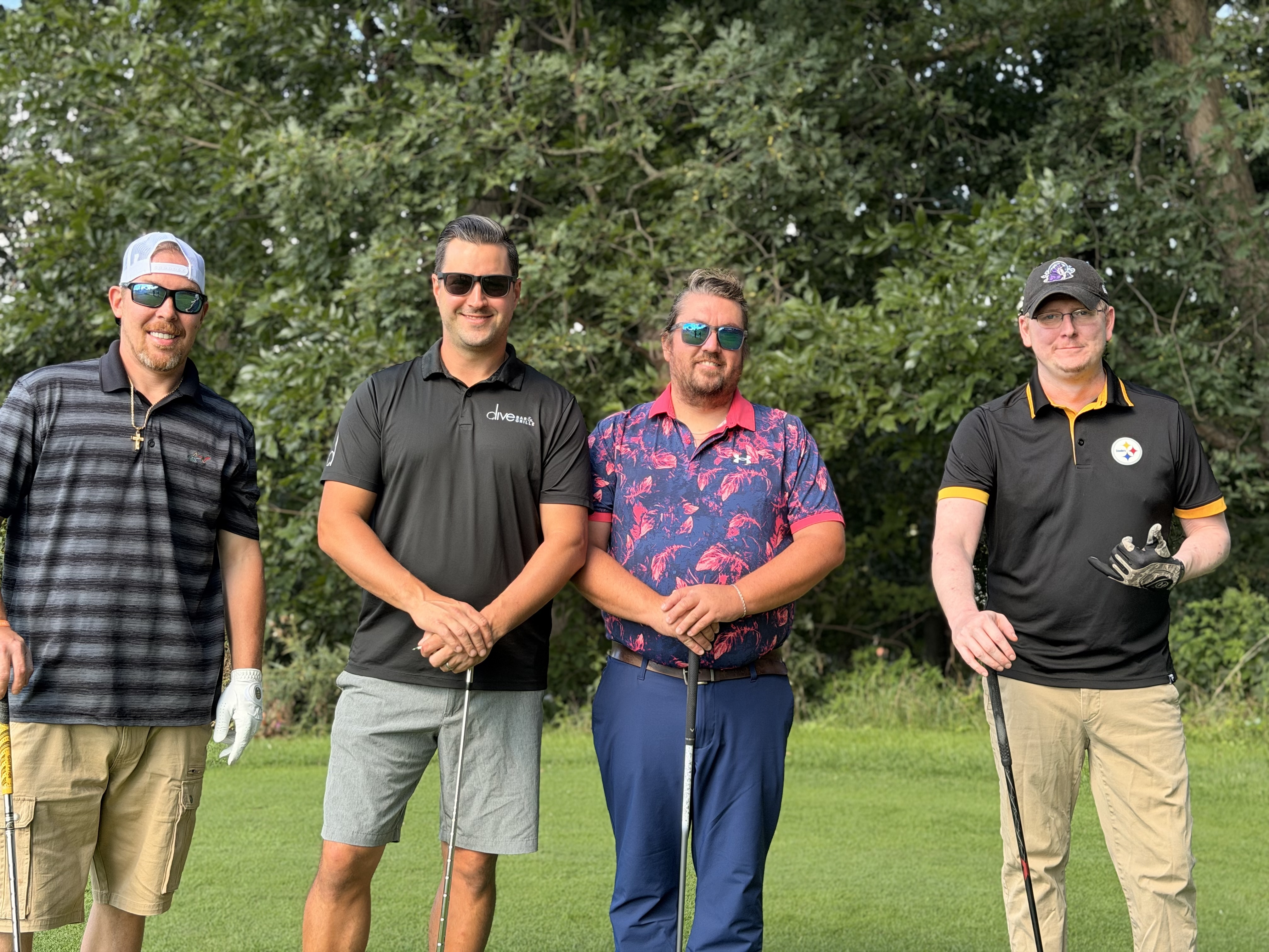 A foursome at Wildwood Country Club on YINZgiving Golf Outing day