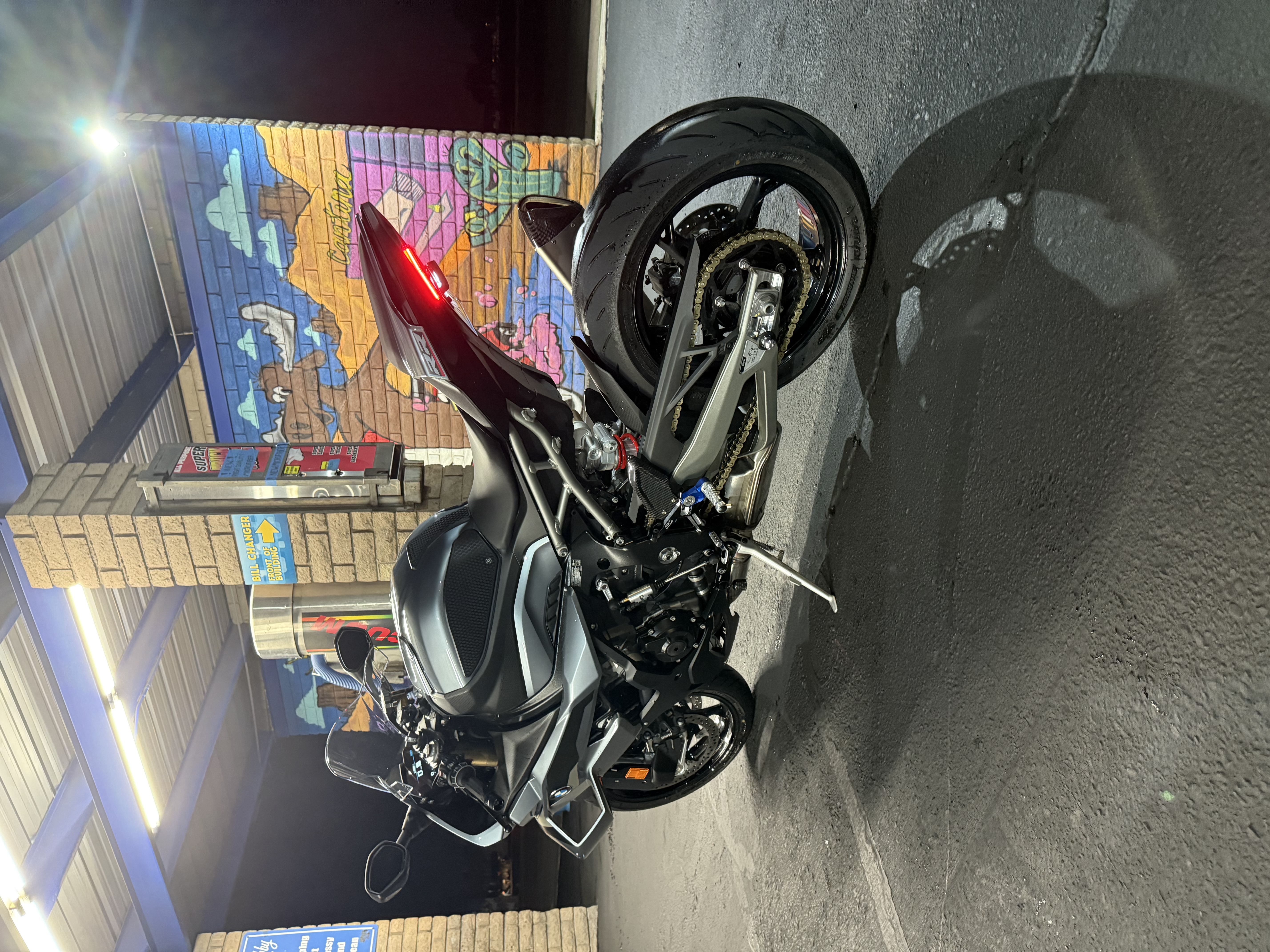 Black motorcycle at Bobby E's self-serve car wash, Tempe