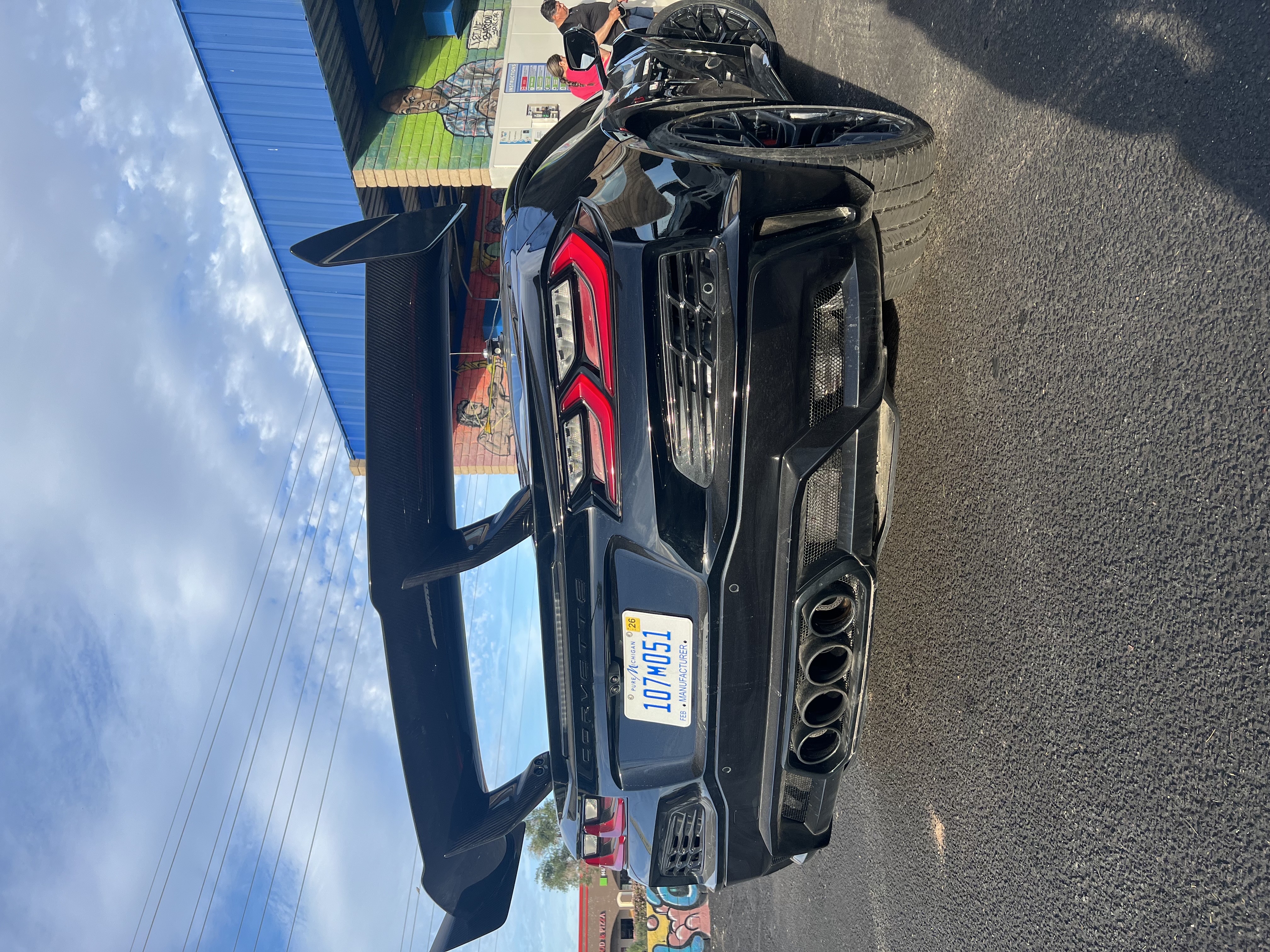 Corvette ZR1X with a carbon wing pulling into Bobby E's