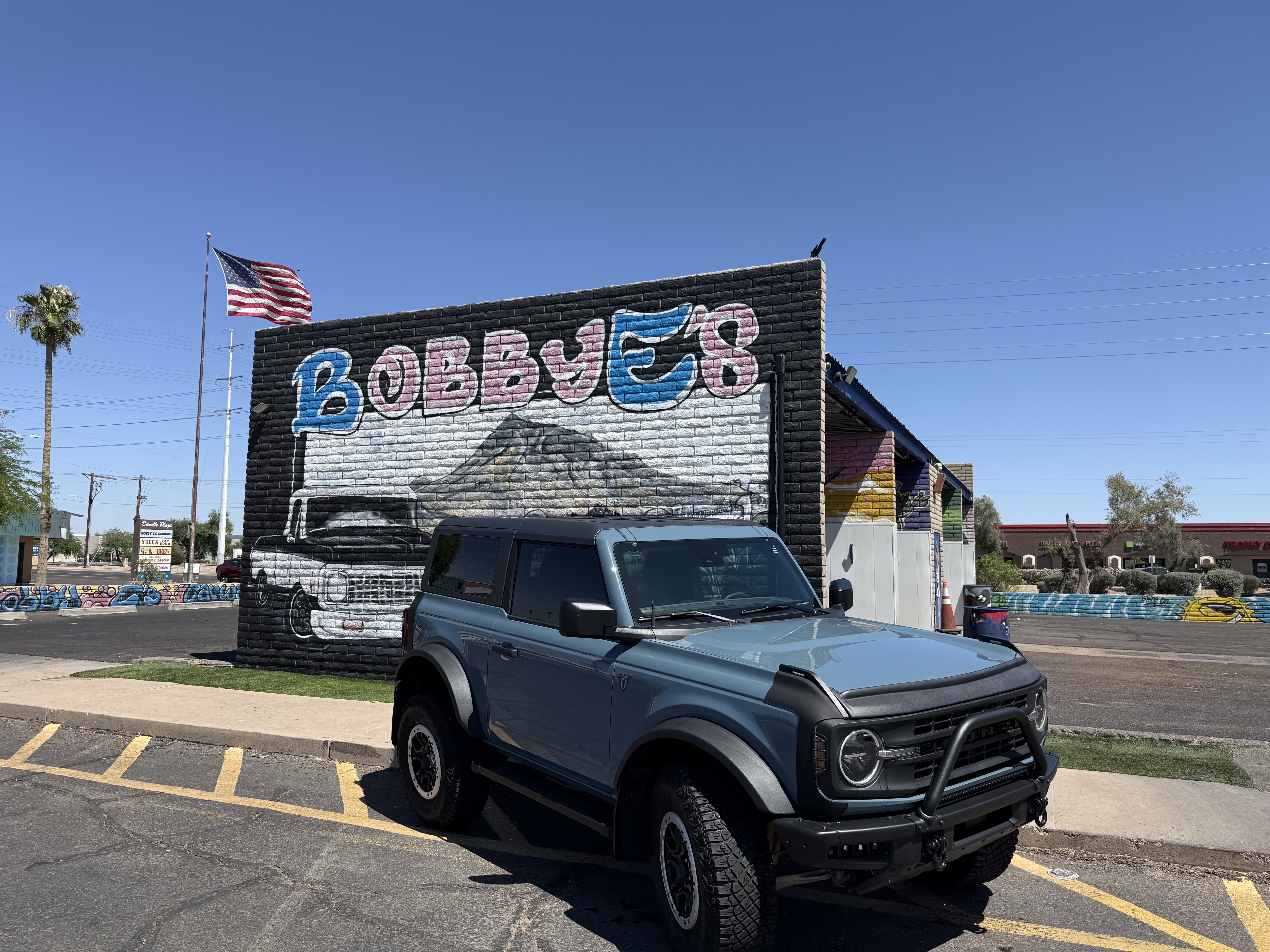 Ford Bronco leaving Bobby E's self-serve bays in Tempe