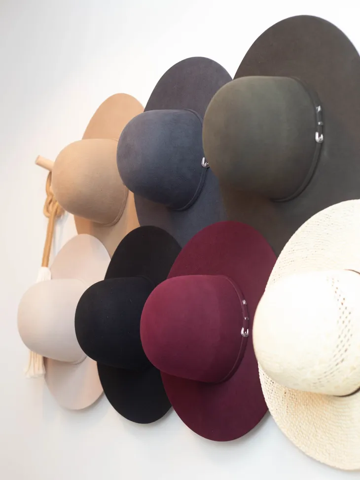 Luxury fur felt hats in burgundy, black, grey and cream at Ace High Hat Bar