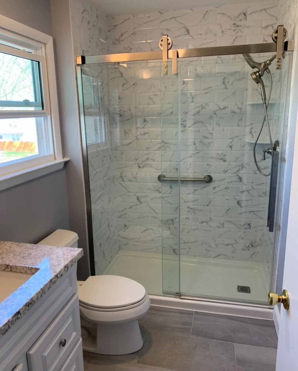 Completed bathroom remodeling work by Michael John Contractors