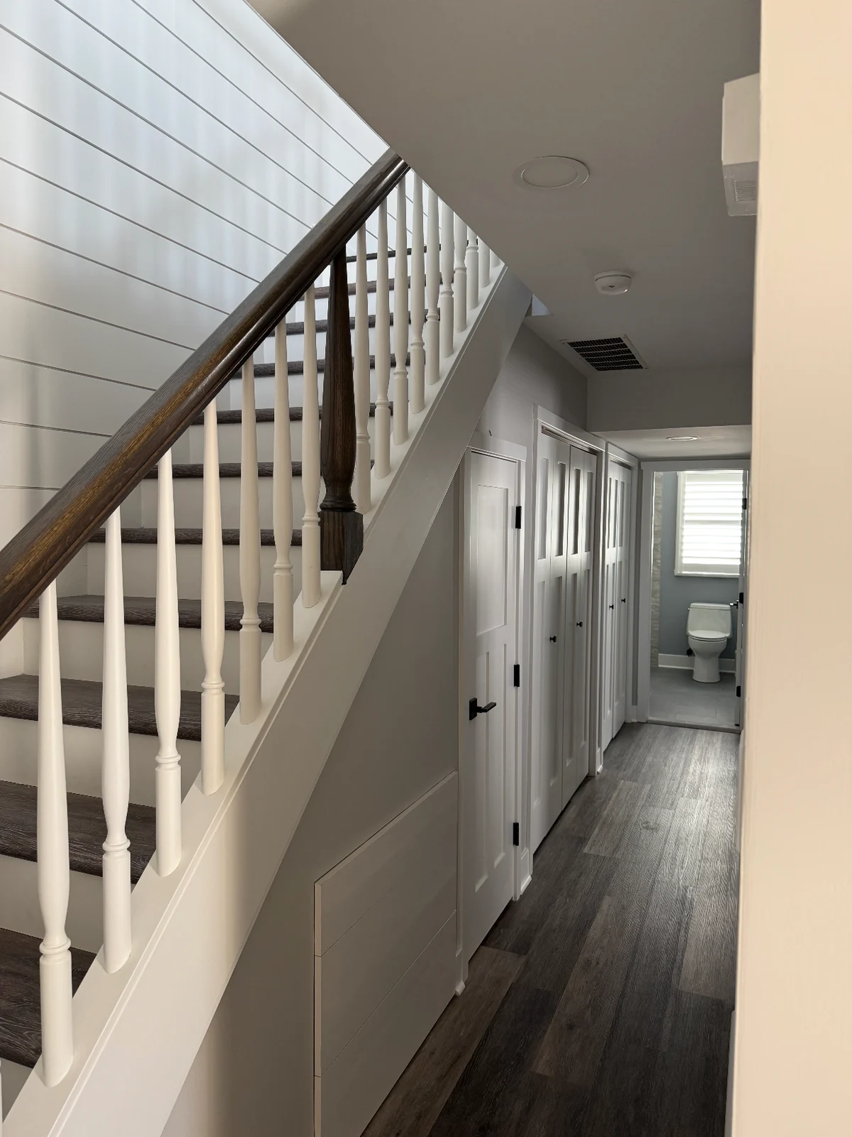 Completed interior hallway and staircase remodeling work by Michael John Contractors
