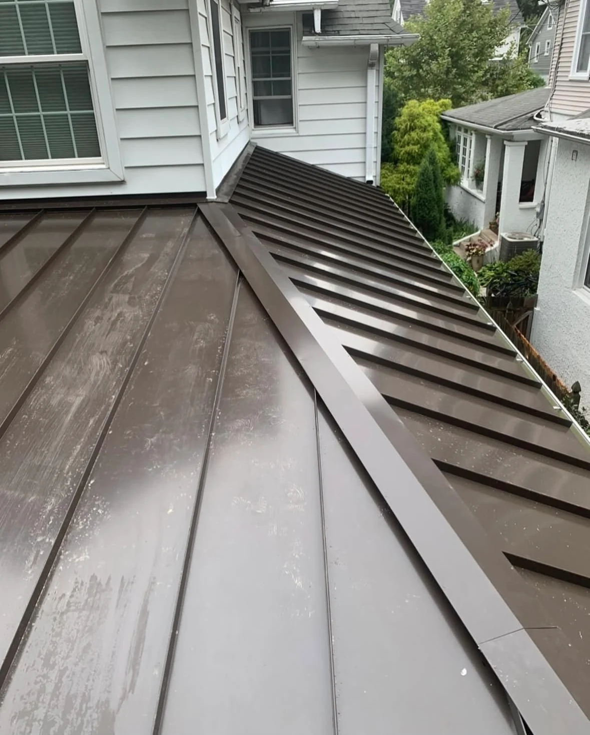 Completed metal roofing installation by Michael John Contractors
