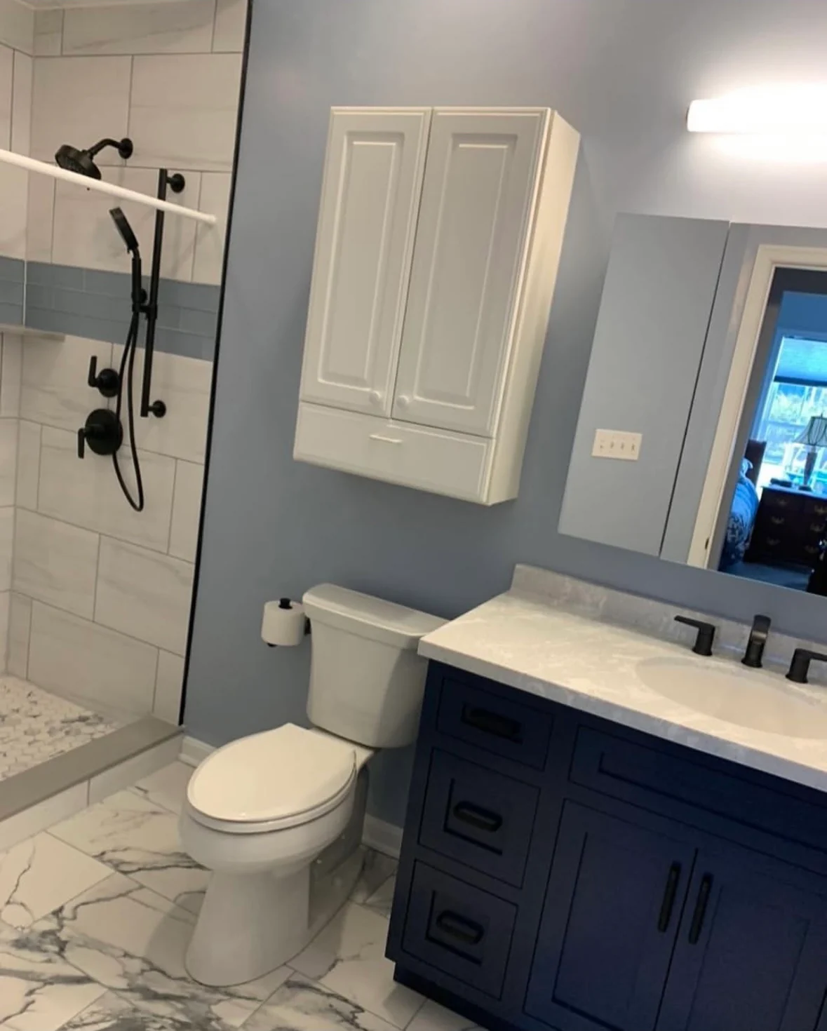 Sea Isle City bathroom with a blue vanity