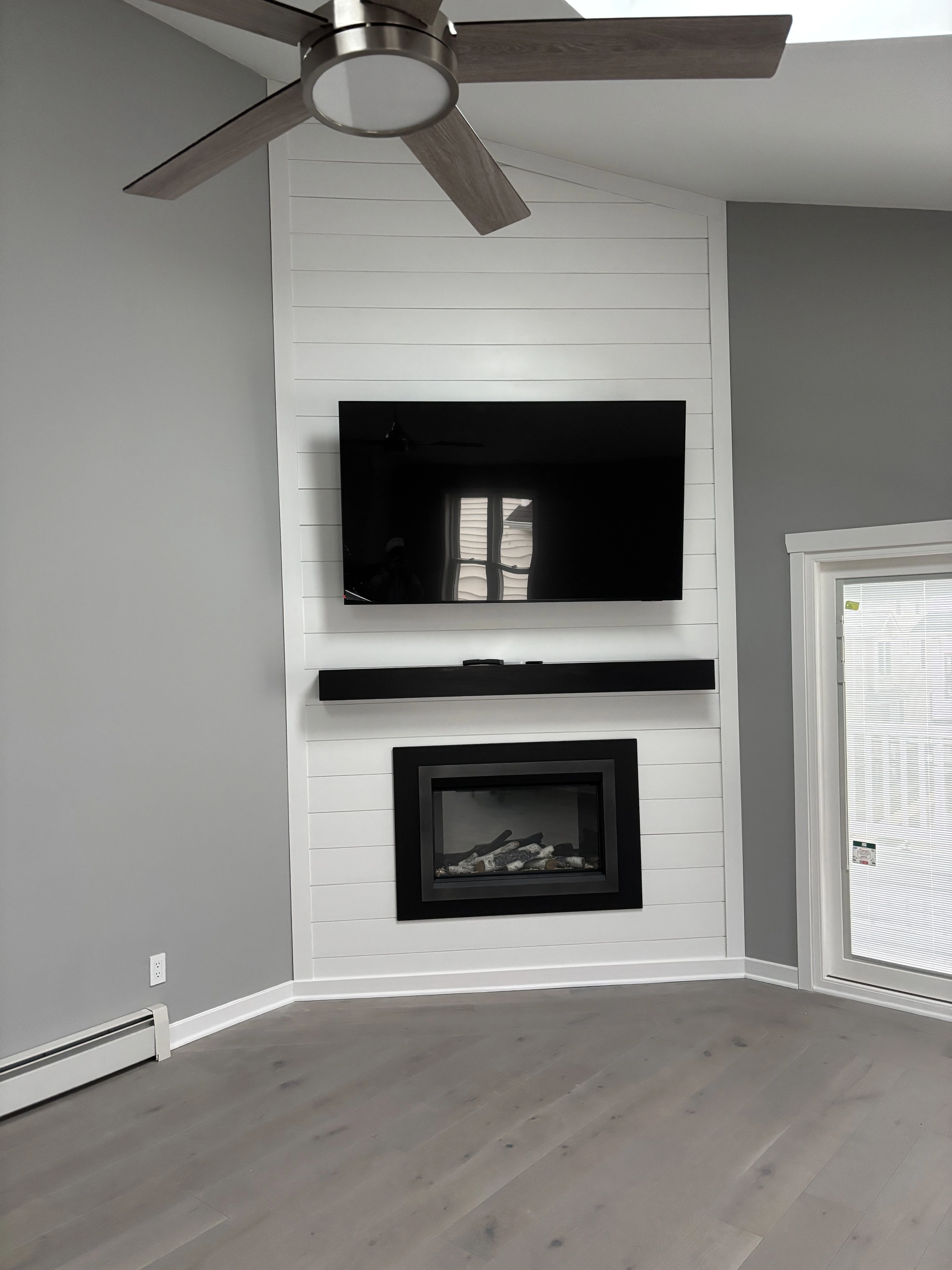 Completed residential living room remodeling work by Michael John Contractors