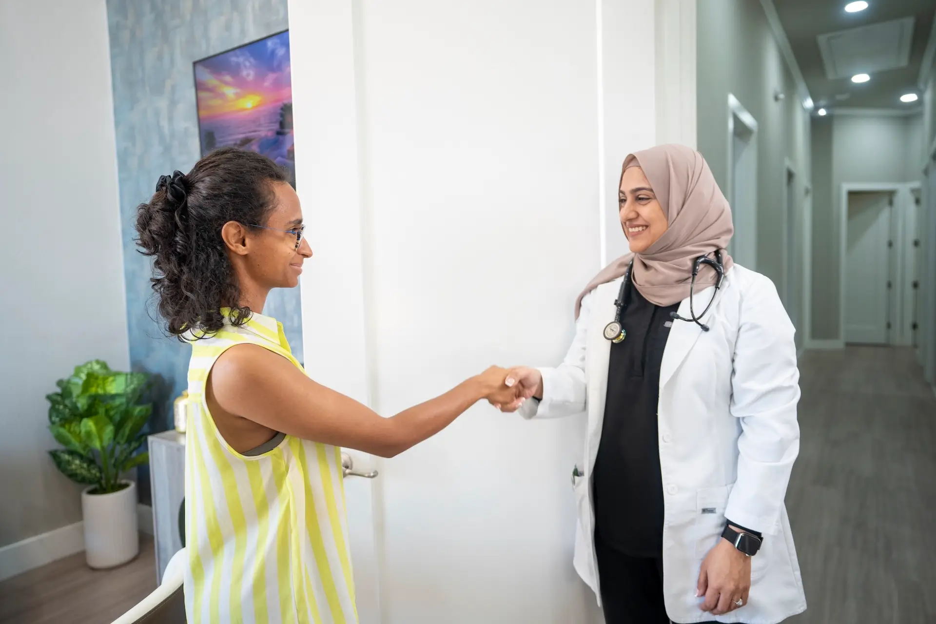 Dr. Aminah Naveed with a patient