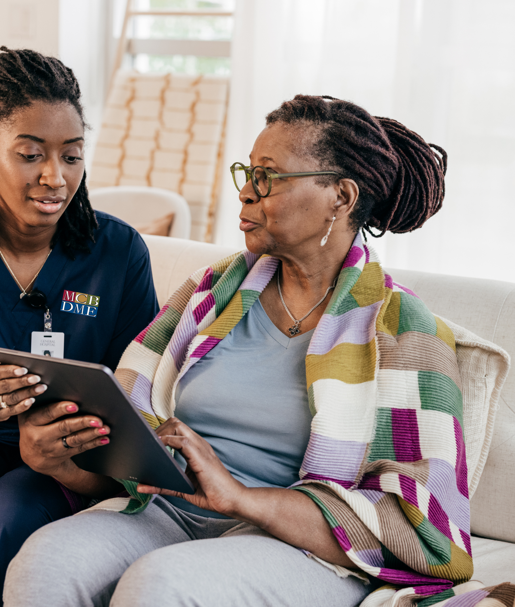 MCB DME specialist in Hawthorne NJ consulting with a lymphedema patient about compression garments and pump therapy