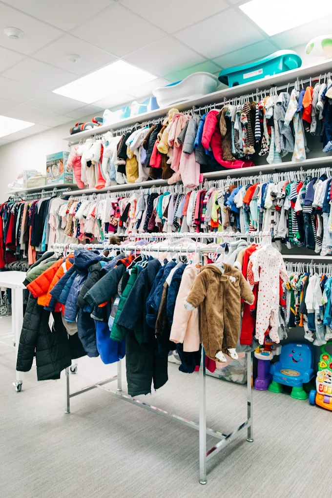 Walk-in full of clothes in our community closet available 