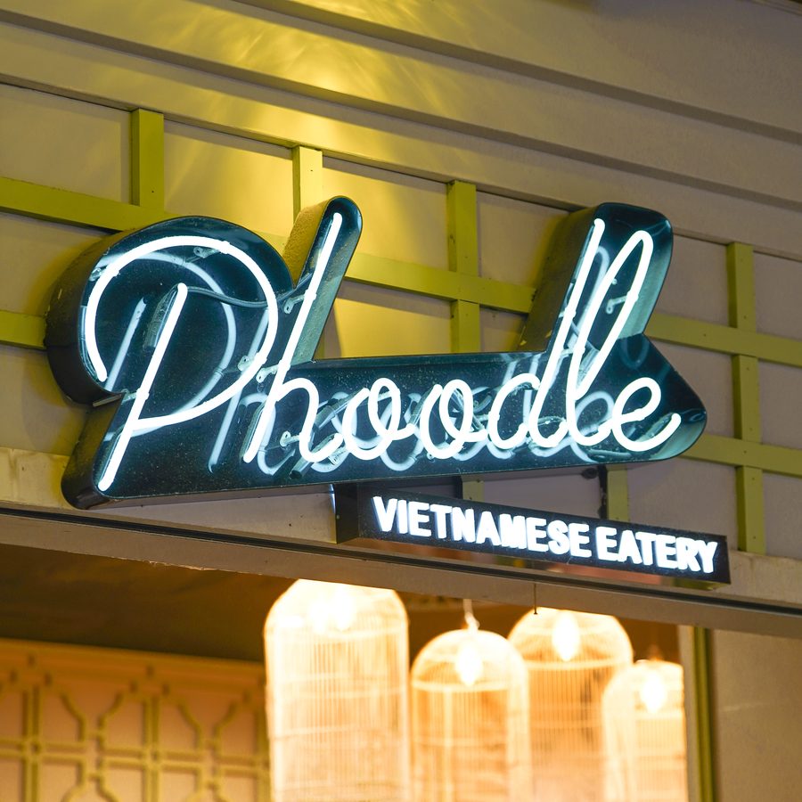 The Phoodle neon sign above our shopfront at Westfield Eastgardens