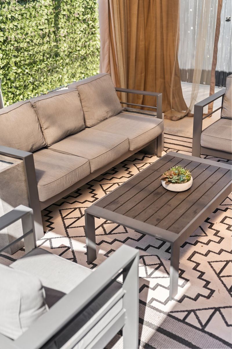Outdoor deck seating area at Anaheim Villa Estates