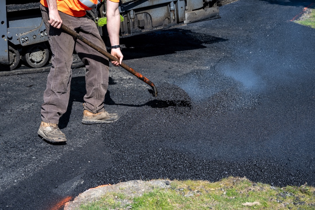 Project One Contracting crew laying hot mix asphalt