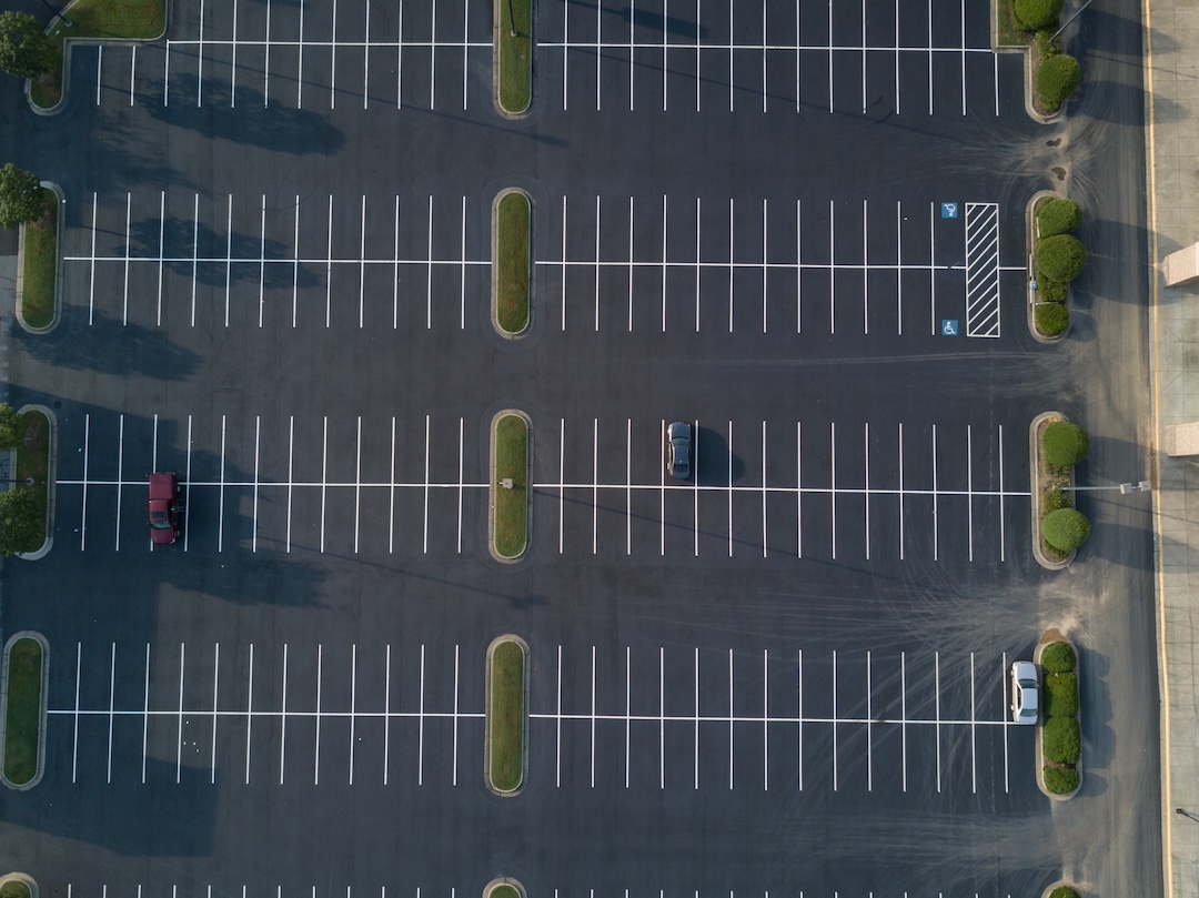Aerial view of completed parking lot with fresh striping