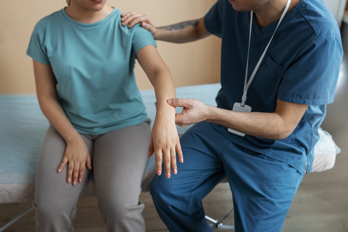 Close up of cervical spine chiropractic adjustment for neck pain in Asheville NC