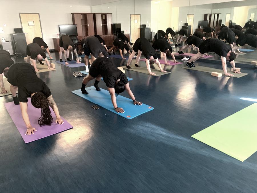 Shanti leading a military unit through recovery and mindset work