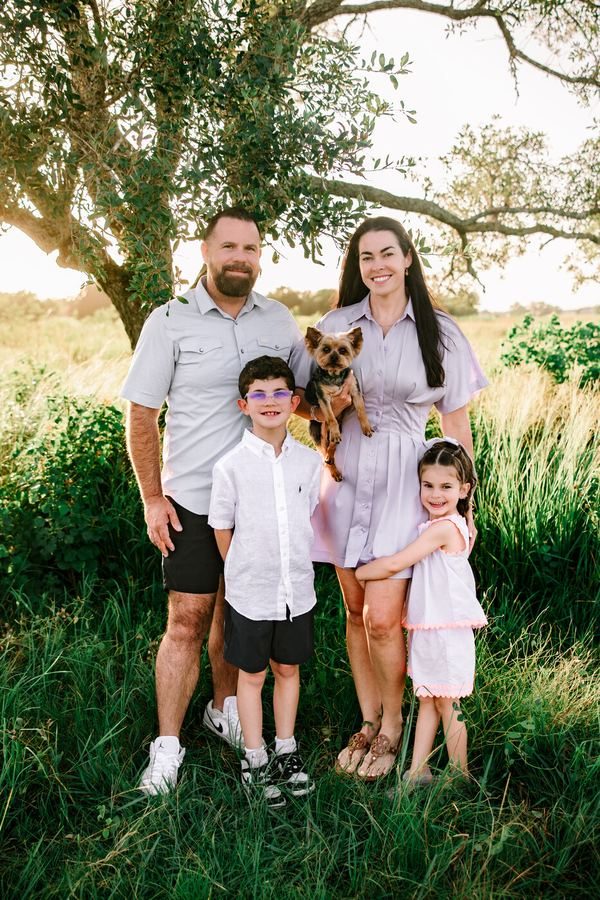 Family portrait session outdoors at golden hour