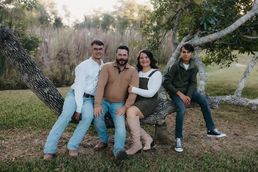 Family portrait session outdoors at golden hour
