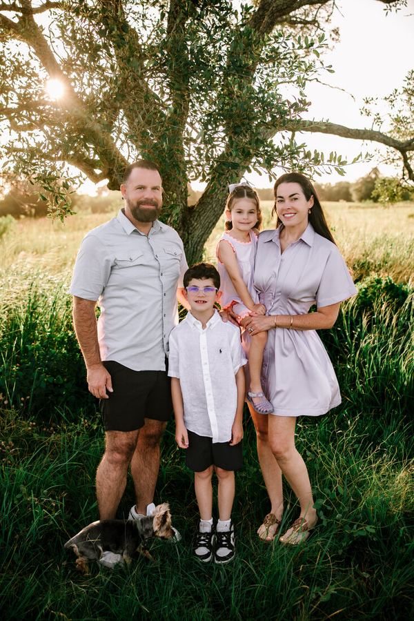 Family portrait session outdoors at golden hour