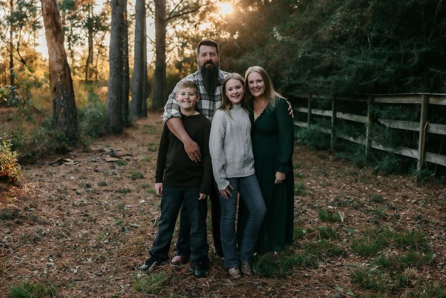 Family portrait session outdoors at golden hour