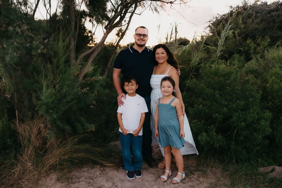 Family portrait session outdoors at golden hour