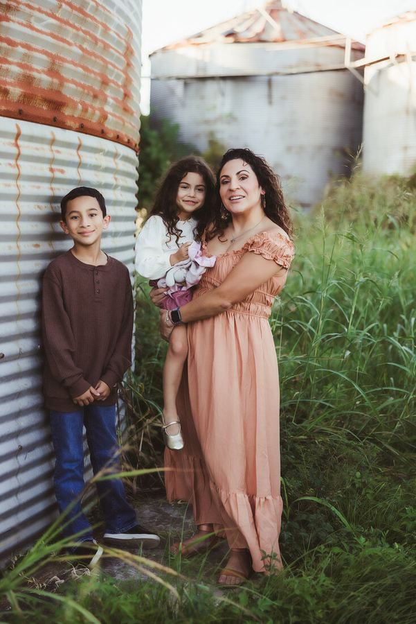 Family portrait session outdoors at golden hour