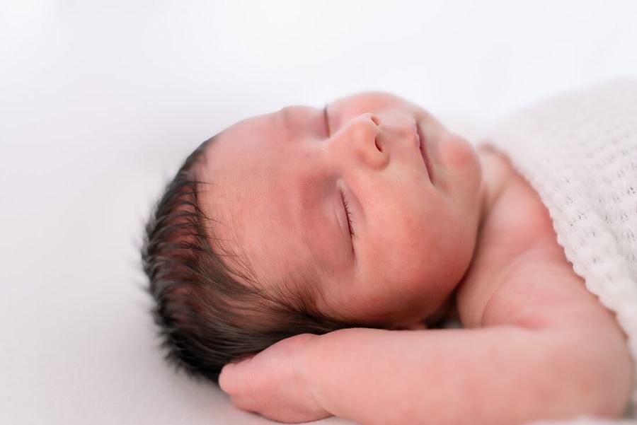 Newborn baby asleep during a studio session