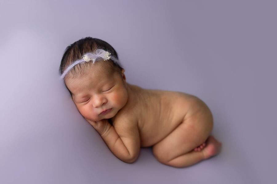 Newborn baby asleep during a studio session