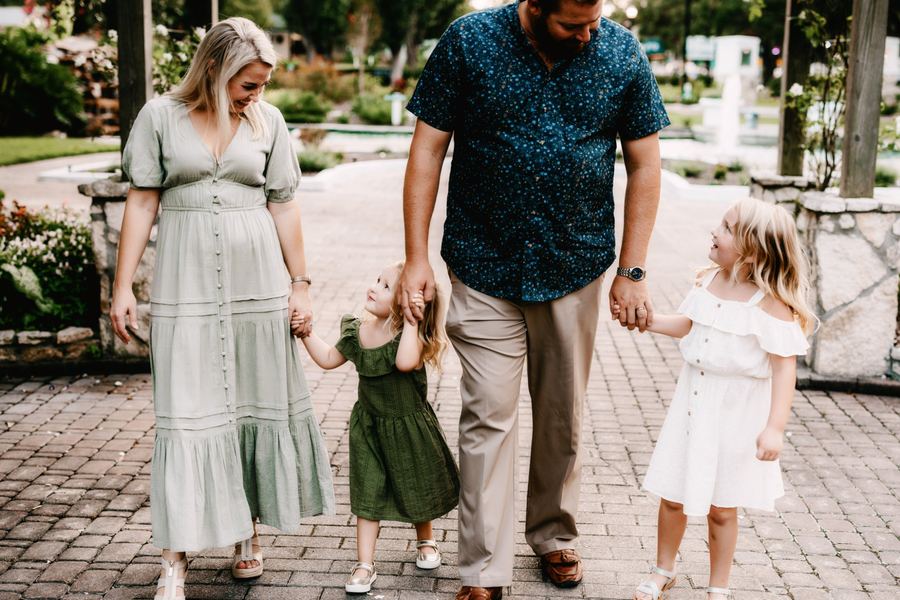 Family portrait session outdoors at golden hour