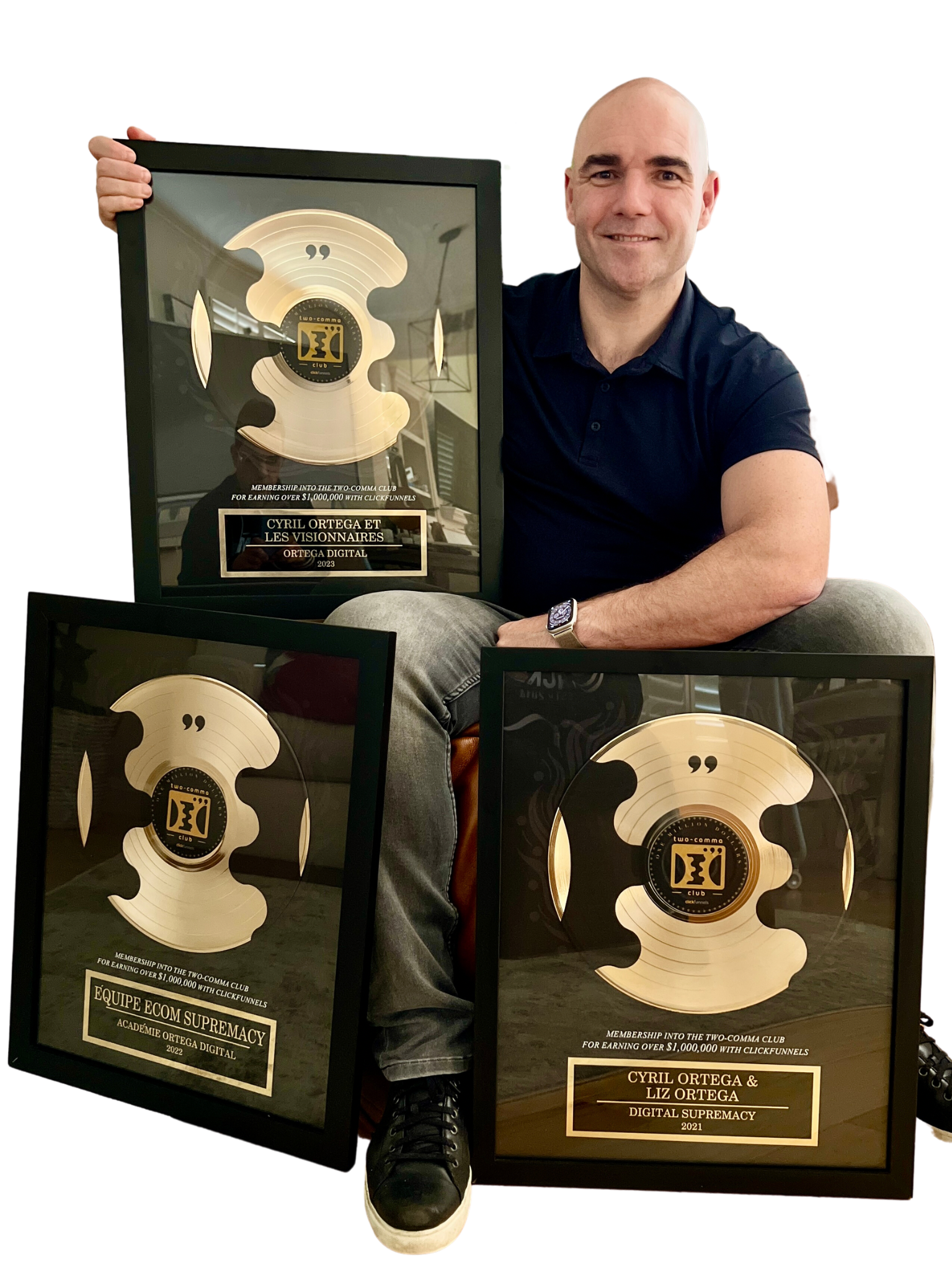 Cyril Ortega holding three ClickFunnels Two Comma Club Awards