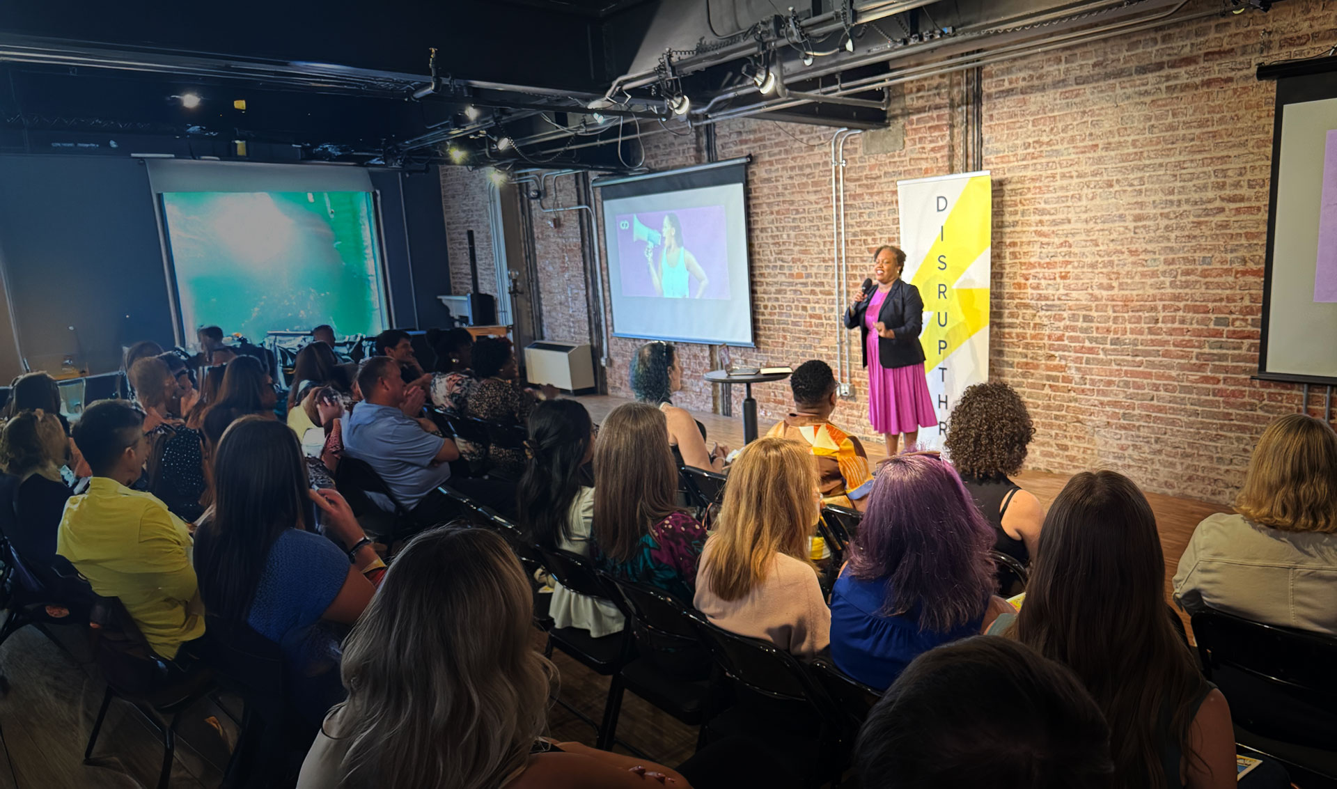 Leadership speaker and Fractional CHRO Coach Dora Mendez delivers her DisruptHR DC presentation to a full audience, sharing insights on leadership and the future of work during her keynote.
