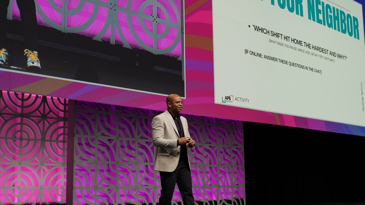 Kelvin Jenkins speaking on stage