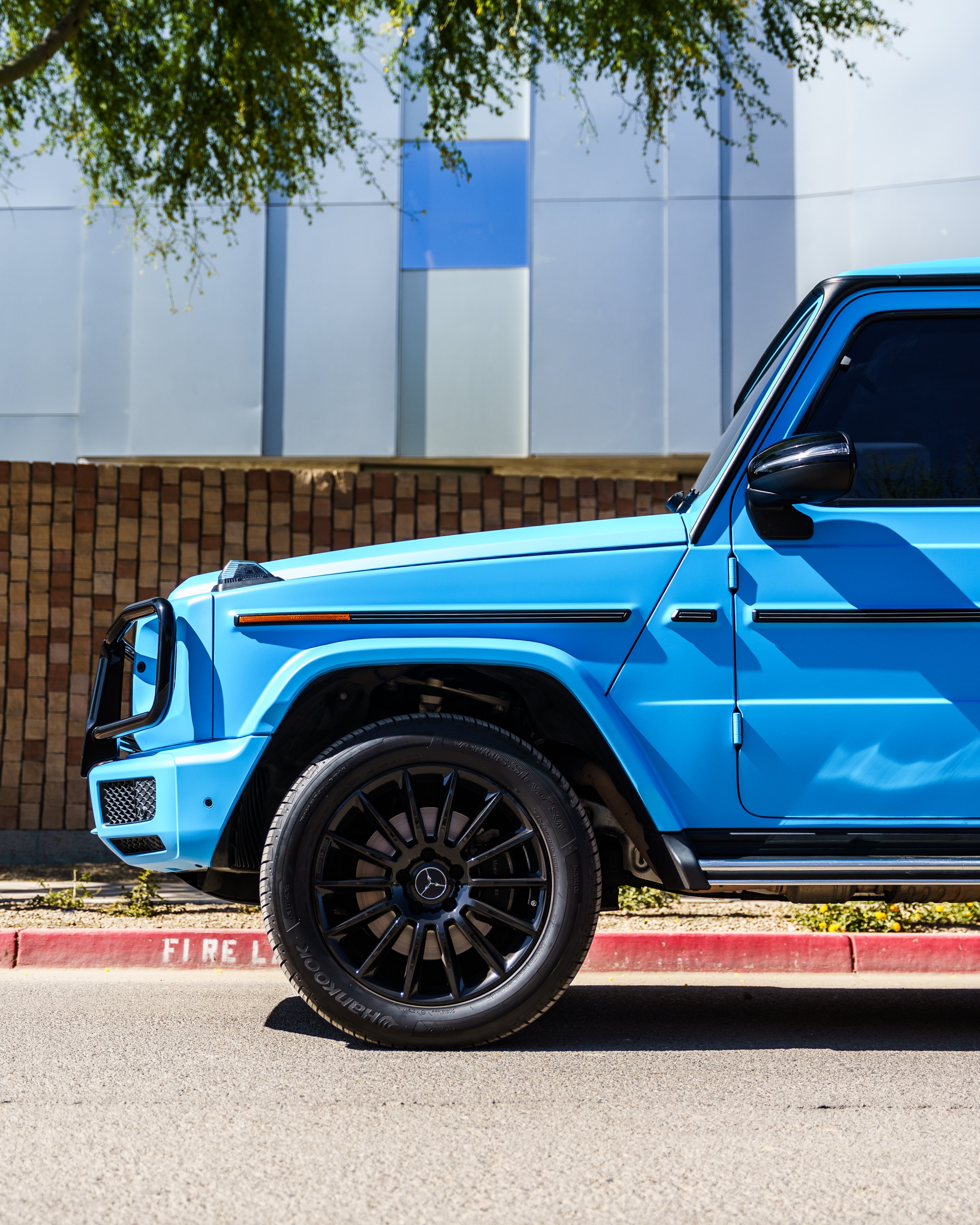 Blue Mercedes G Class at collision repair shop