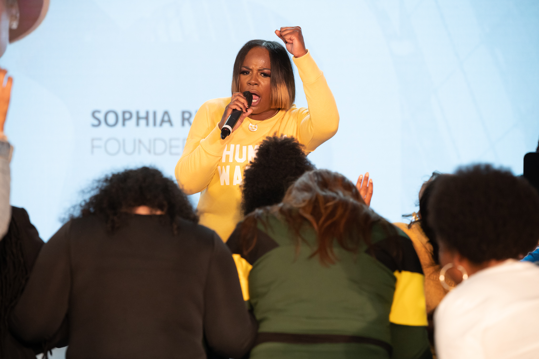 Sophia Ruffin leading and encouraging a group