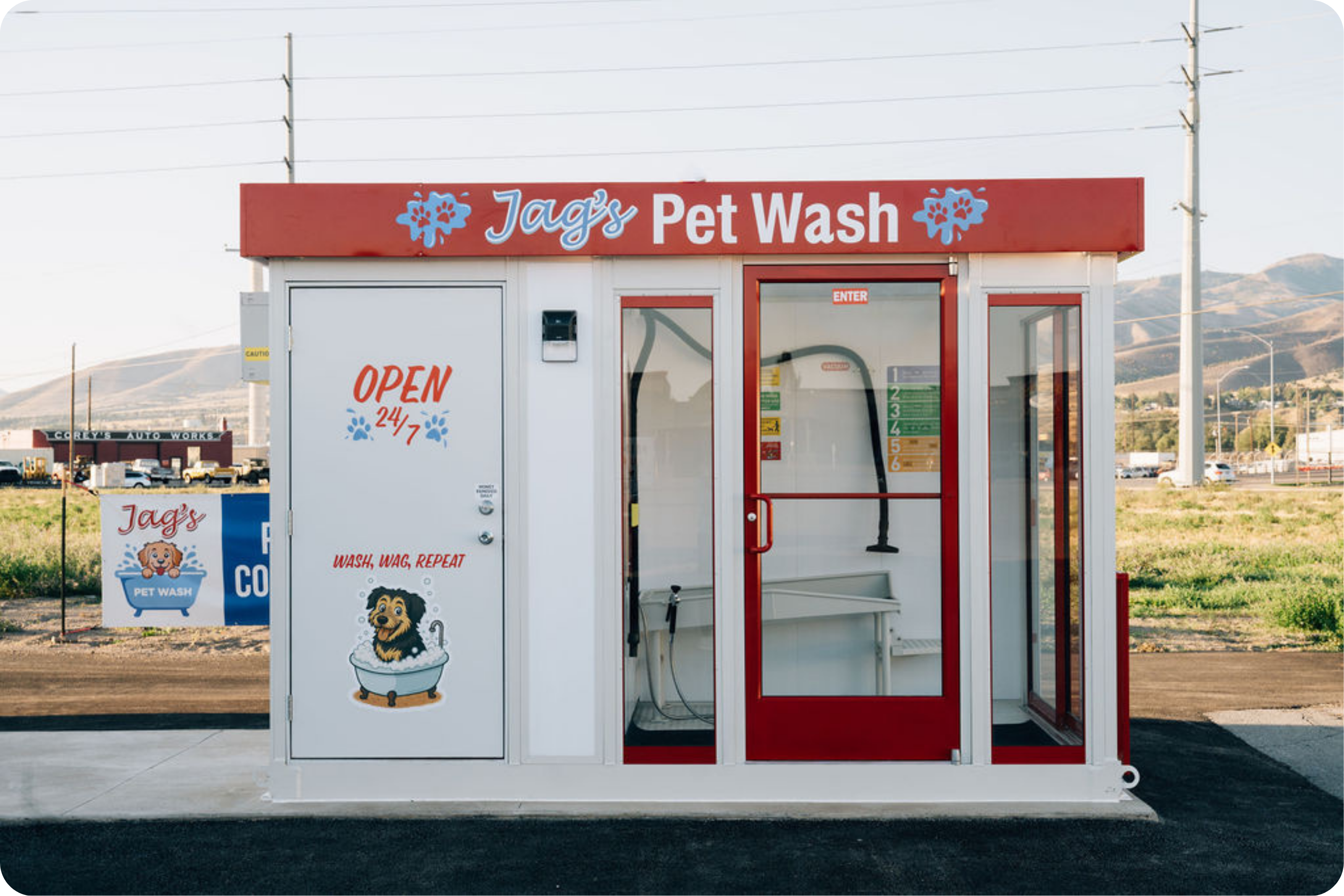 Jag’s Pet Wash 24/7 self-service dog wash station in Pocatello, Idaho with open sign and wash bays.