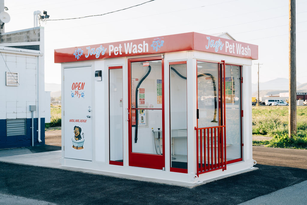 Jag’s Pet Wash 24/7 self-service pet wash station in Pocatello, Idaho with red and white design.