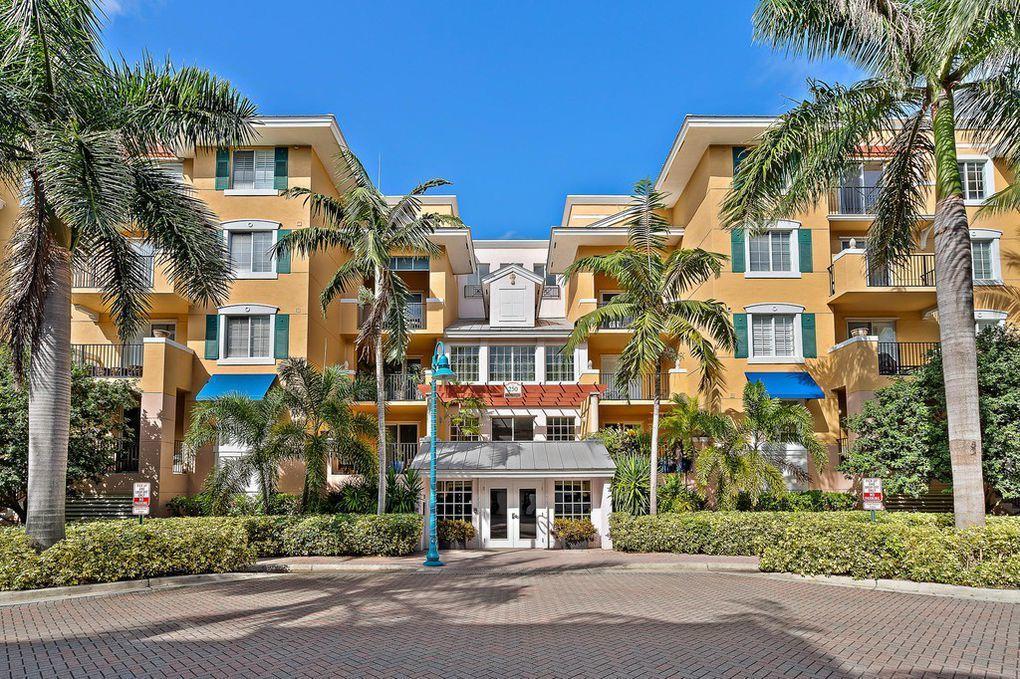 Pineapple Grove Village Mediterranean Revival condo community with tile roofs, Delray Beach