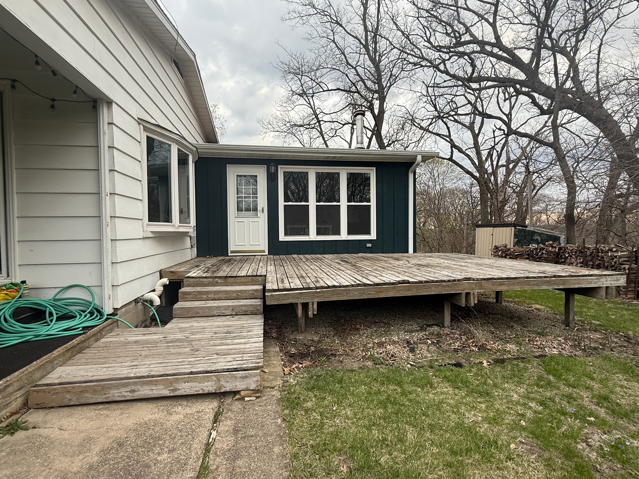 The same Oglesby, Illinois property before Envision Builders built the composite deck
