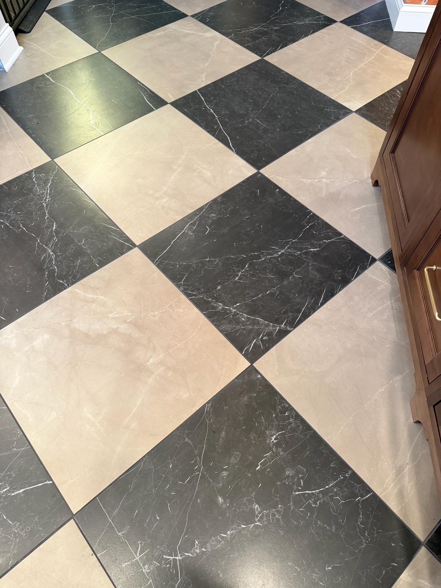 Finished tile work from a kitchen remodel by Envision Builders in Peru, Illinois