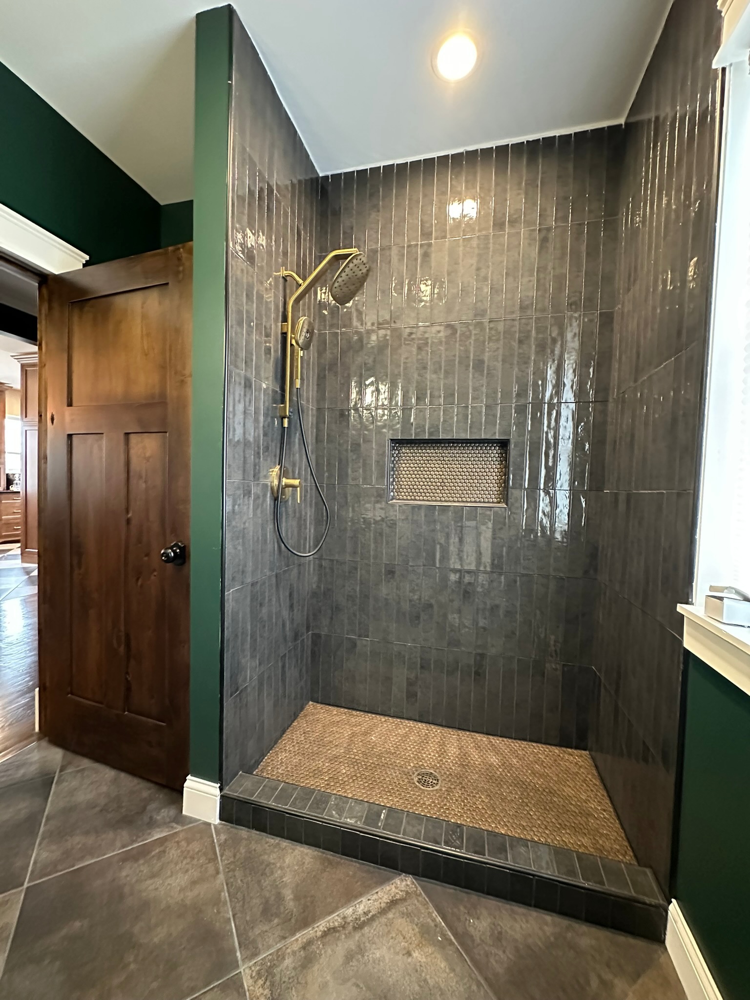 The finished bathroom remodel completed by Envision Builders in Peru, Illinois