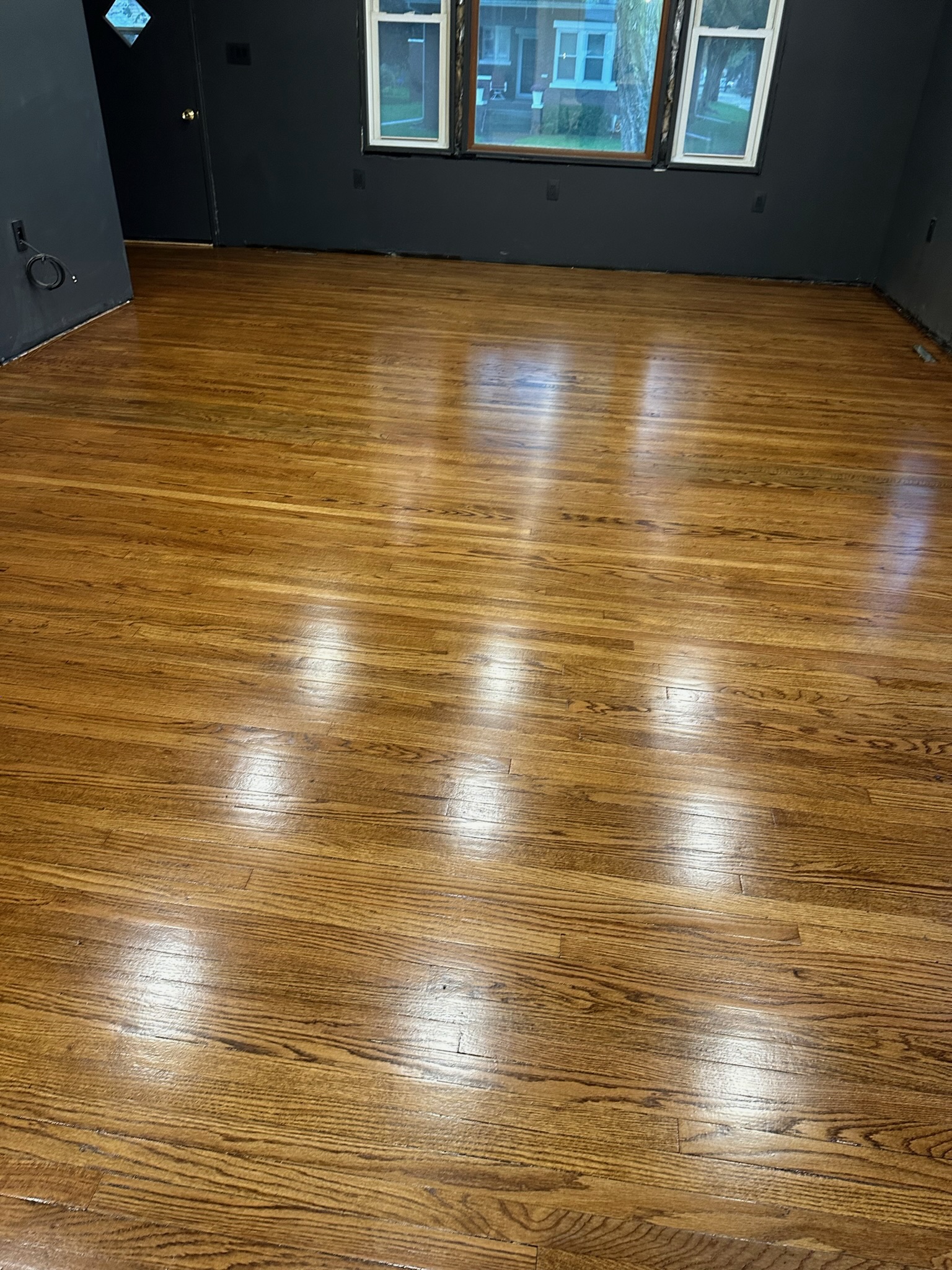 Finished hardwood flooring installed by Envision Builders in the Illinois Valley