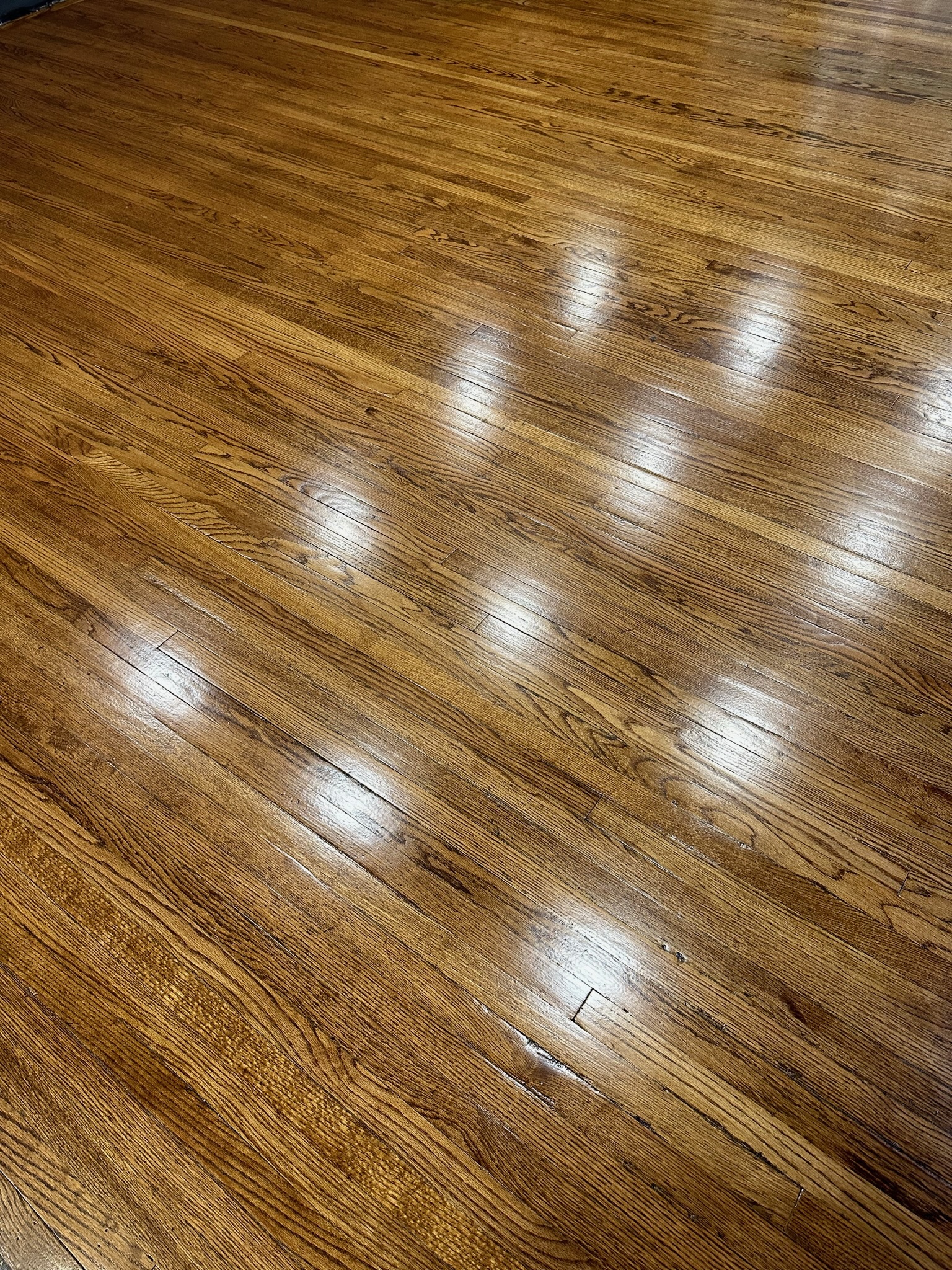 Finished hardwood flooring installed by Envision Builders in the Illinois Valley