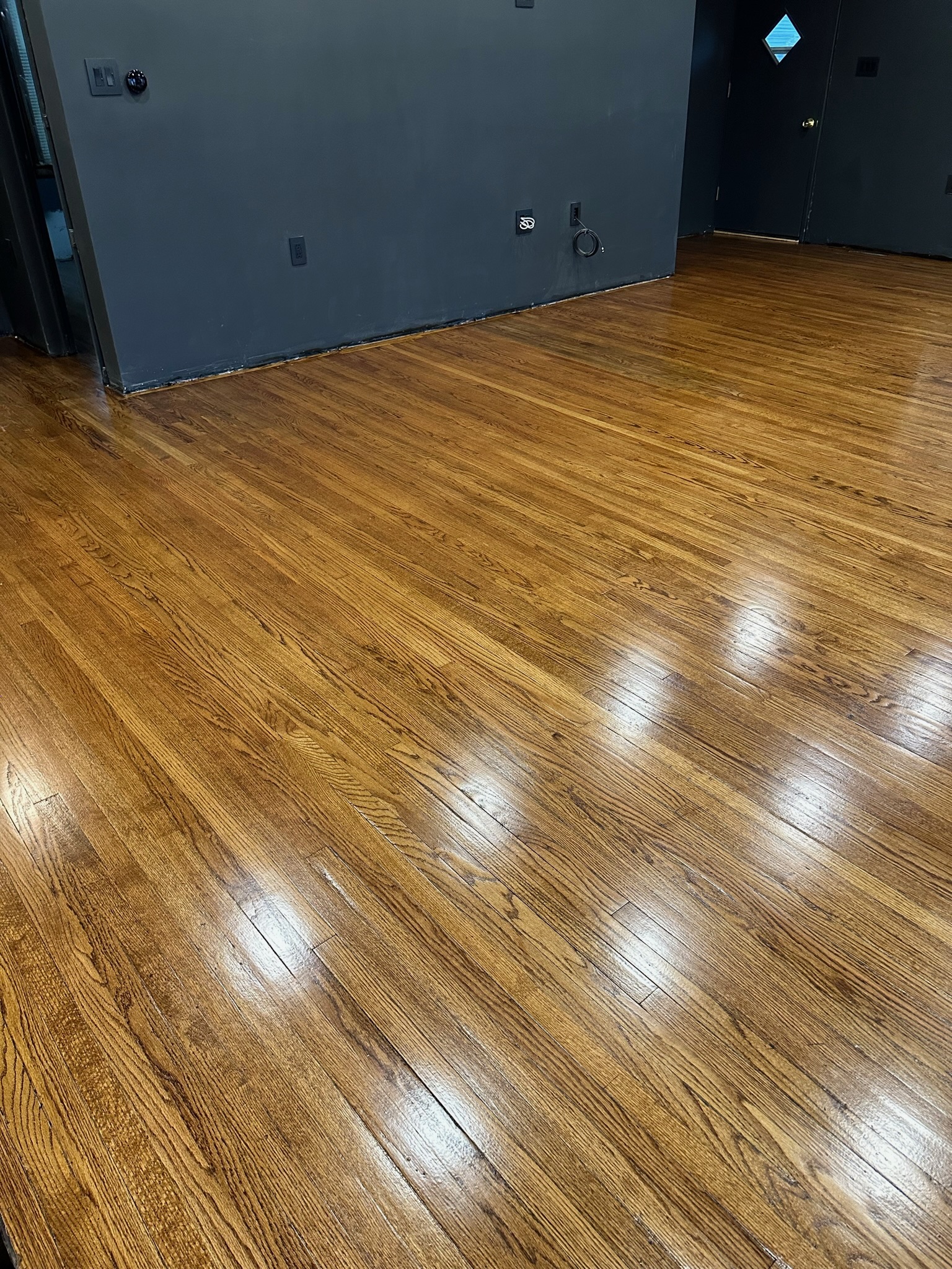 Finished hardwood flooring installed by Envision Builders in the Illinois Valley