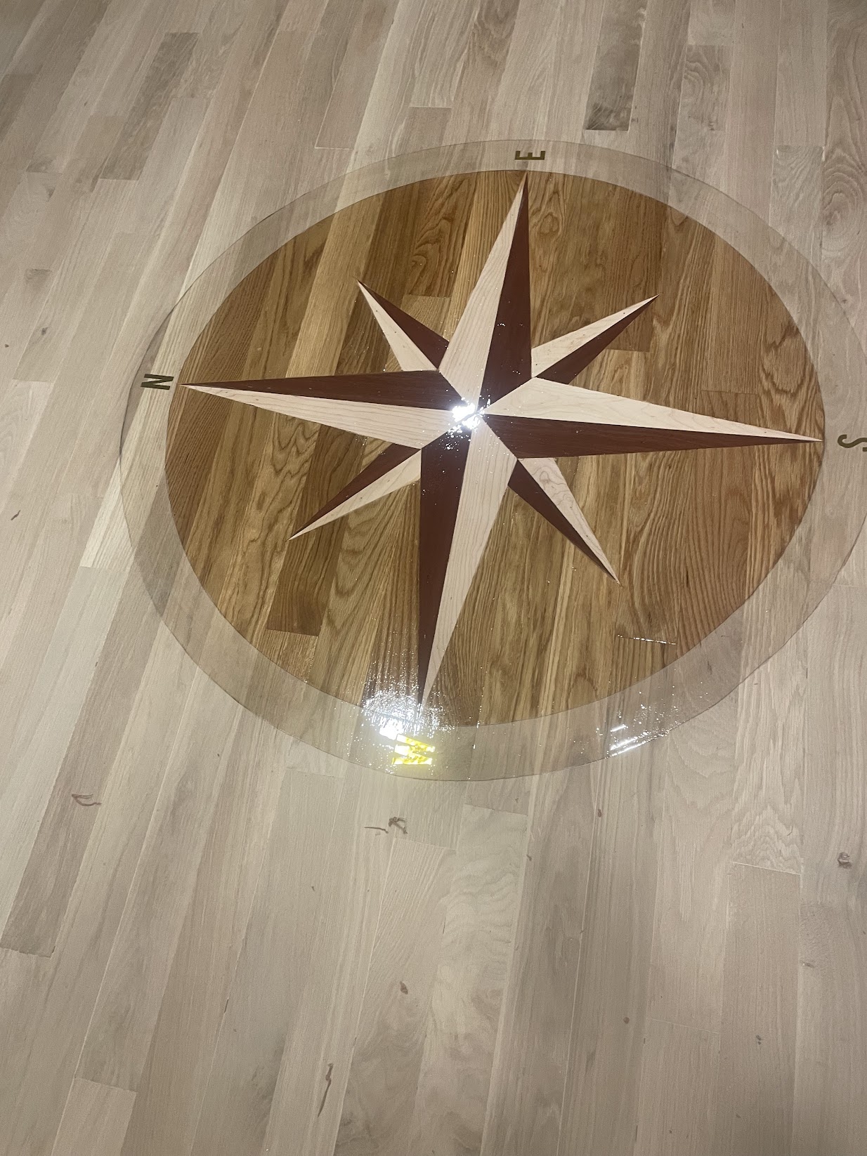 Finished specialty hardwood flooring installed by Envision Builders in the Illinois Valley