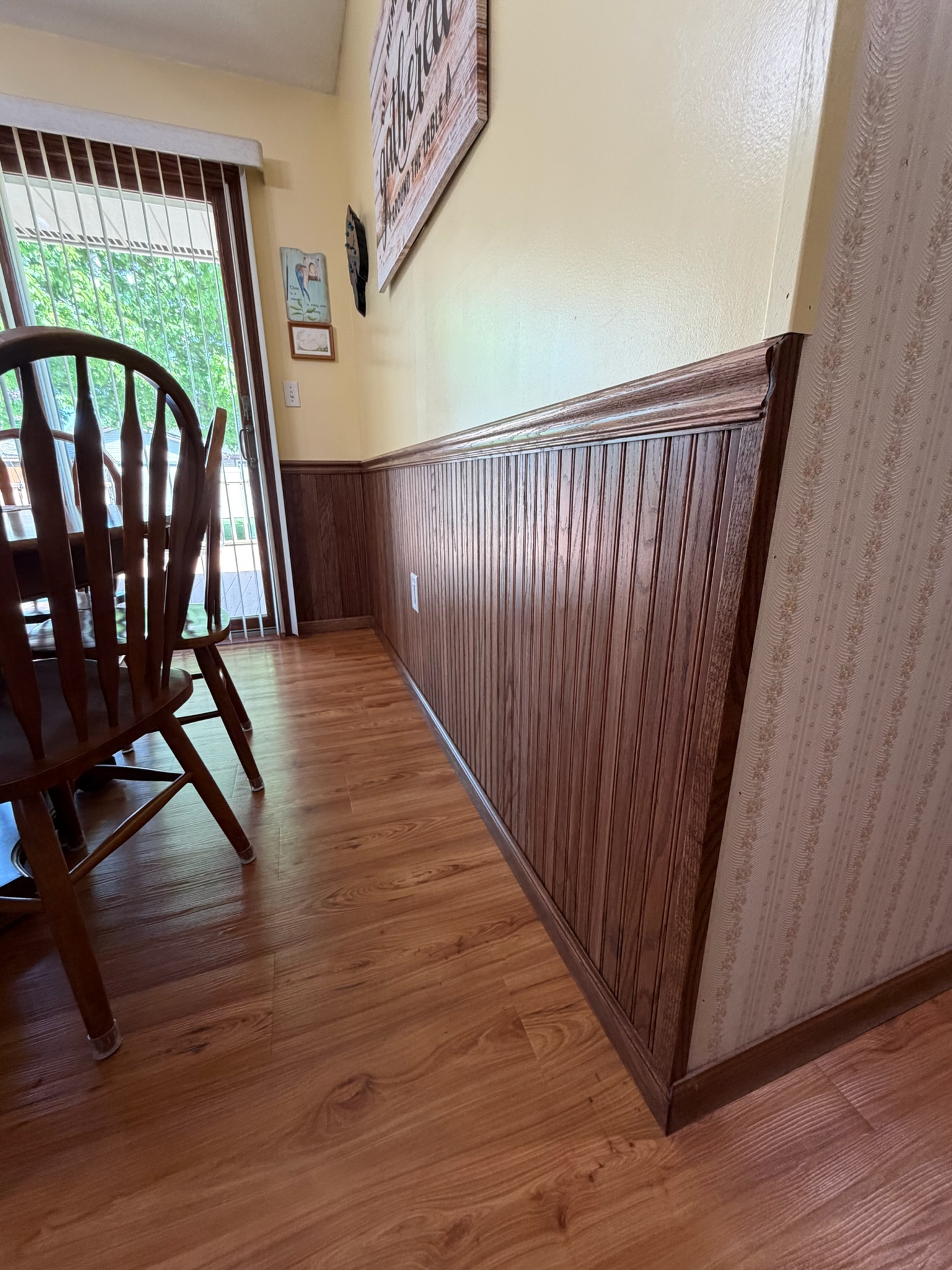 Completed wainscoting installation by Envision Builders in the Illinois Valley