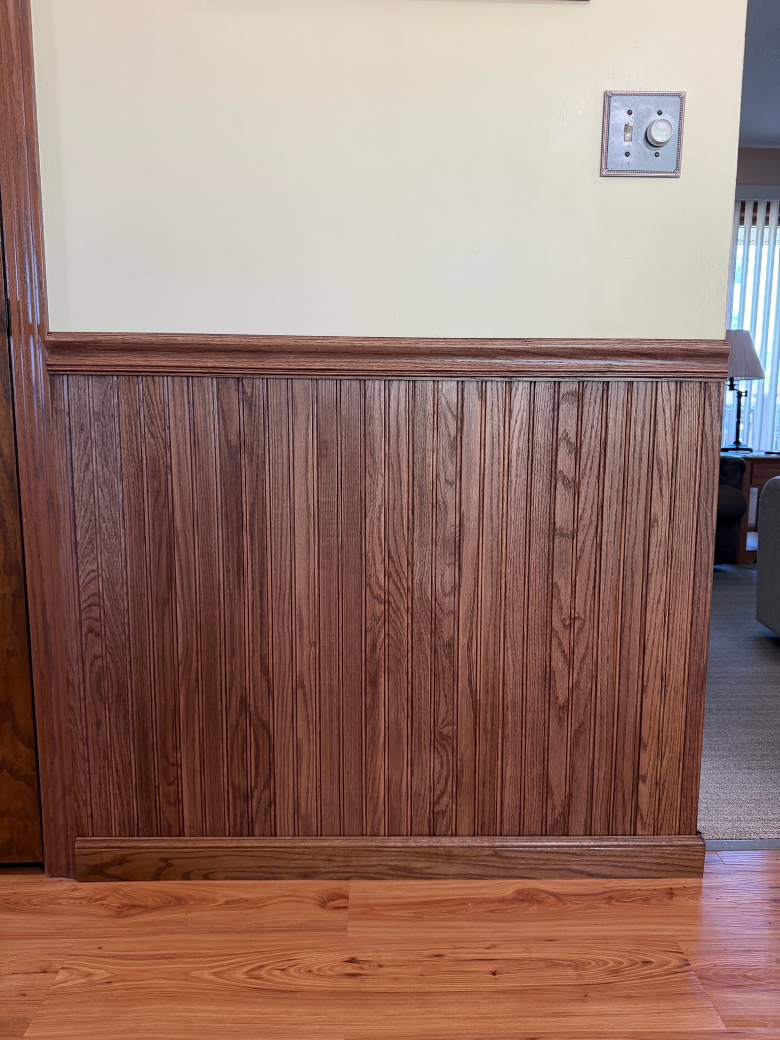 Completed wainscoting installation by Envision Builders in the Illinois Valley