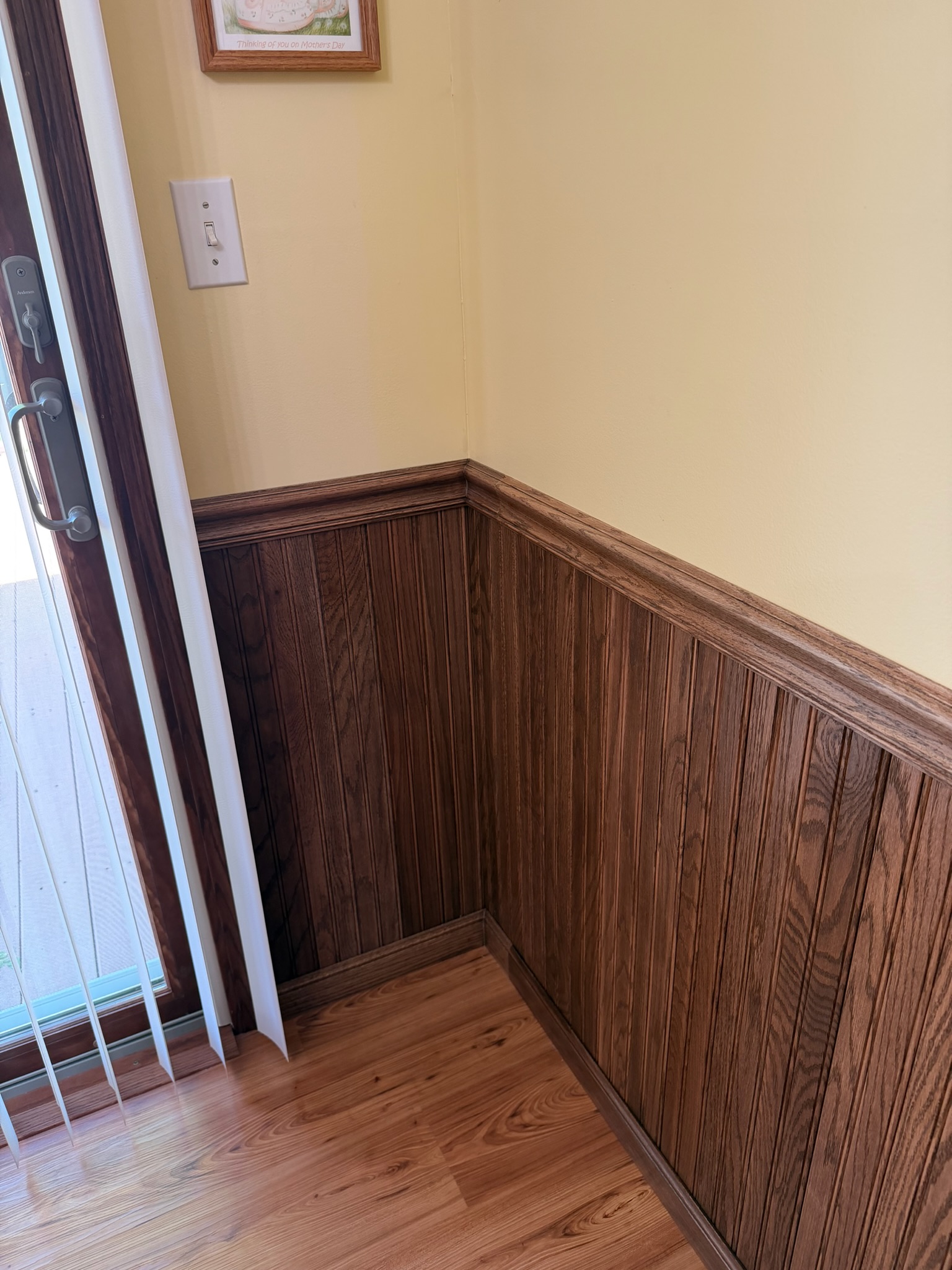 Completed wainscoting installation by Envision Builders in the Illinois Valley